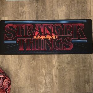 Stranger Things Large Black Desk Mat - Red & Orange Graphic